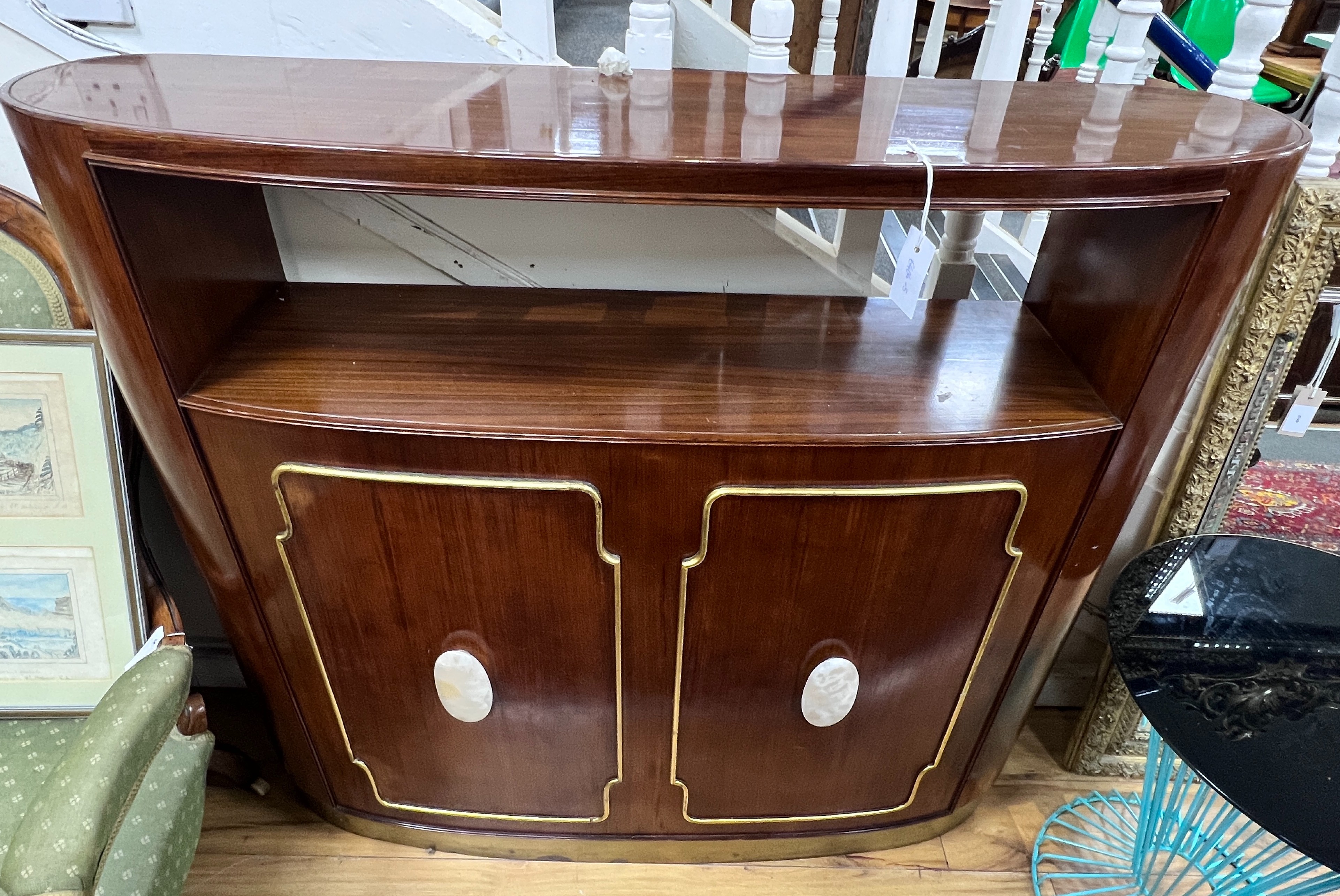 A mid century design Paolo Buffa 'Drybar' or 'Yacht Bar' of bowfront form with faux mother of pearl mounts